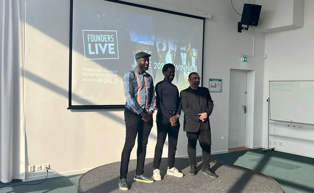 Junior, Kwabena and the Founders Live host at a pitching stage.